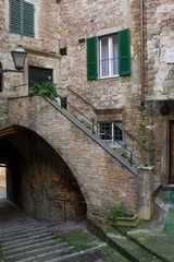 Fototapeta na wymiar Ancient stone house in Perugia historic city centre, Italy