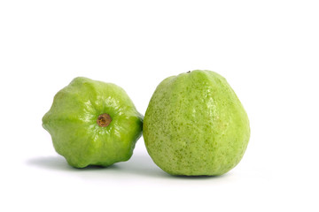 Two green crystal guava fruit isolated on white background