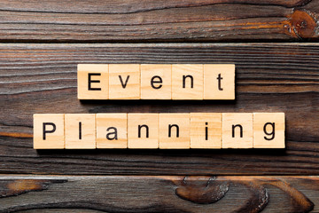 EVENT PLANNER word written on wood block. EVENT PLANNER text on wooden table for your desing, concept