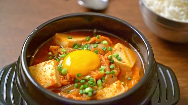 &lsquo;Kimchi Jjigae&rsquo; or Kimchi Soup with Soft Tofu or Korean Kimchi Stew  - Korean Food Traditional Style