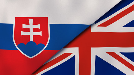 The flags of Slovakia and United Kingdom. News, reportage, business background. 3d illustration