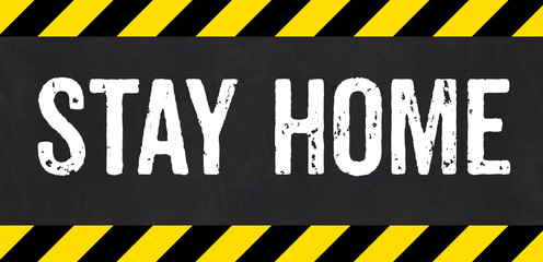 Sign with caution stripes - Stay home