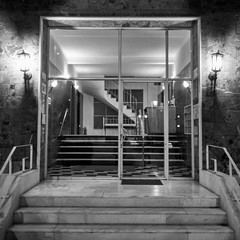 Athens Greece, glamorous 60's residential apartment building entrance door, black and white shot