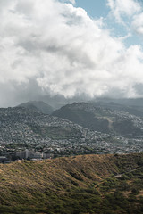 Dramatic views from the top of the Diamond Head Crater Hike on a bright but cloudy day.