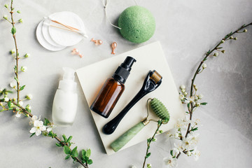 Dermaroller and serum next to an anti aging face cream Beauty industry  Dermaroller for medical...