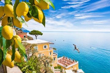 Beautiful Positano on hills leading down to coast, comfortable hotels and azure sea on Amalfi Coast in Campania, Italy. Amalfi coast is popular travel in Europe.