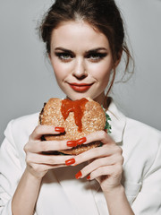 young woman eating cake