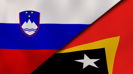 The flags of Slovenia and East Timor. News, reportage, business background. 3d illustration