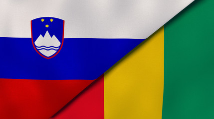 The flags of Slovenia and Guinea. News, reportage, business background. 3d illustration