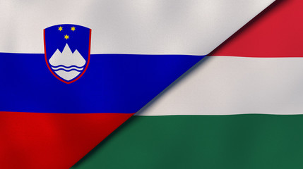 The flags of Slovenia and Hungary. News, reportage, business background. 3d illustration