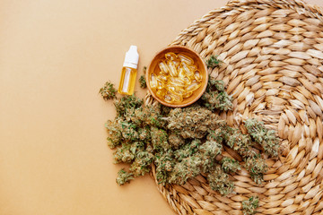 Close up view of medical marijuana buds with hemp oil.