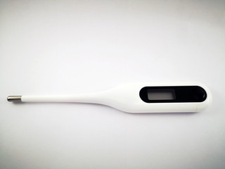 White electronic thermometer on a white background. Isolate.