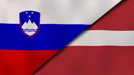 The flags of Slovenia and Latvia. News, reportage, business background. 3d illustration