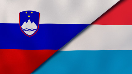 The flags of Slovenia and Luxembourg. News, reportage, business background. 3d illustration