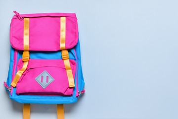 School backpack on light background