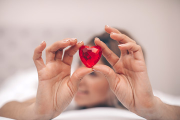 heart in hands. Valentine day. Woman hand holding red heart. Love photo. 