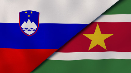 The flags of Slovenia and Suriname. News, reportage, business background. 3d illustration