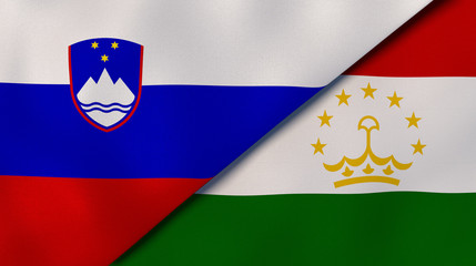 The flags of Slovenia and Tajikistan. News, reportage, business background. 3d illustration