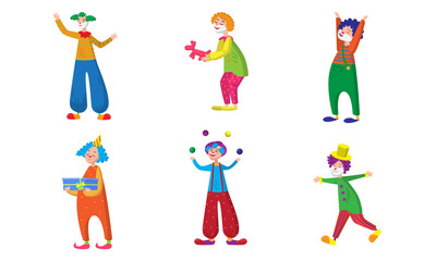 Set of positive clowns during show in colorful costumes with accessories