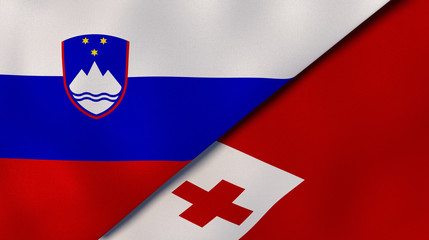 The flags of Slovenia and Tonga. News, reportage, business background. 3d illustration