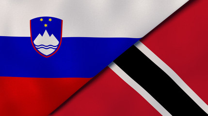 The flags of Slovenia and Trinidad and Tobago. News, reportage, business background. 3d illustration
