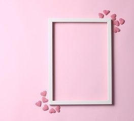 Valentine's day background - frame on pastel pink background