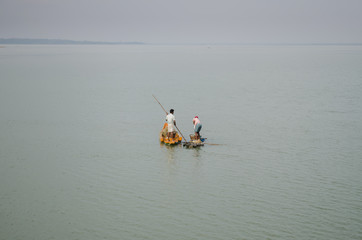 fishermen busy in Fishing on a river