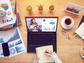 work from home. people making video conference with colleague via laptop computer during home...