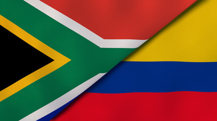 The flags of South Africa and Colombia. News, reportage, business background. 3d illustration