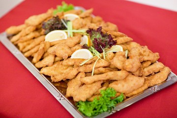 Food and drink at the restaurant. Table setting. Tasting dishes.
Set of cold snacks, canape, beverages, closeup  parte meals
Meals set for holiday, event, party or reception in outdoor restaurant.