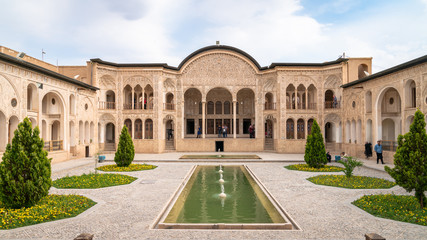 Fototapeta na wymiar Kashan, Iran - May 2019: Tourists visiting Tabatabaei Natanzi Khaneh Historical House in Kashan, Iran