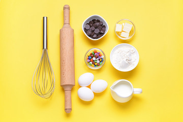 Ingredients for preparing bakery on color background