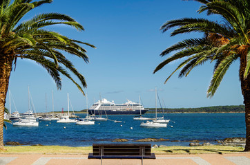 Luxury cruiseship or cruise ship liner Azamara Pursuit at sea with panoramic view of coastal...