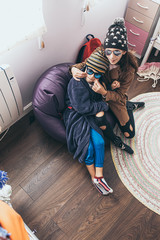 children dressed up at home. Playing at home during confinement