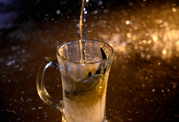 glass, drink, water, tea, splash, beverage, alcohol, beer, cold, cup, liquid, isolated, ice, white, pouring, fresh, drop, refreshment, pour, black, whiskey, splashing, transparent, mug, bubble