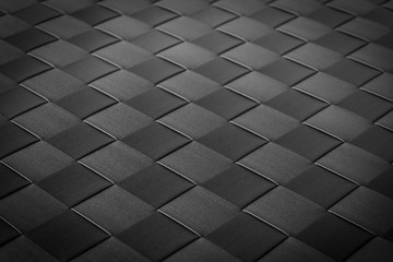 Image of black objects with squares arranged in rows Suitable as a background image.