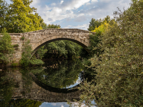 View of the old bridge at sunset, Puente de Sanabria, Zamora, Spain