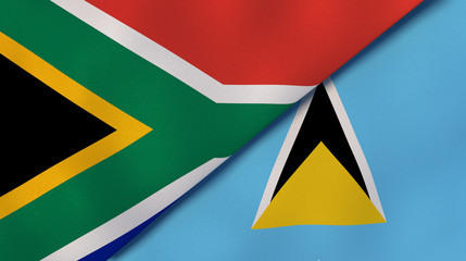 The flags of South Africa and Saint Lucia. News, reportage, business background. 3d illustration