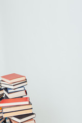 lots of stacks of educational books to teach in the library on a white background