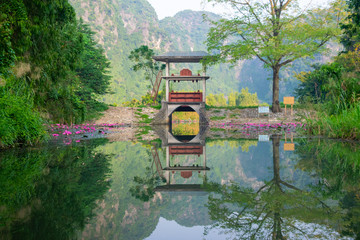 Picture perfect peaceful reflection in the water somewhere in Vietnam.