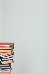 lots of stacks of educational books to teach in the library on a white background