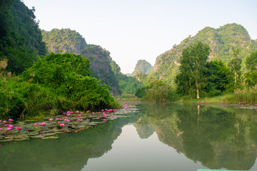Boat on the river early in the morning in Ninh Binh, Vietnam.