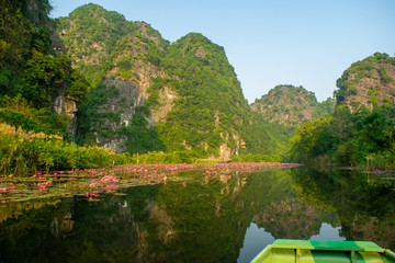 Boat on the river early in the morning in Ninh Binh, Vietnam.