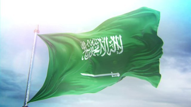a 4K loop animated flag on a pole with a bright blue sky in the background, Kingdom of Saudi Arabia flag waving through the wind in slow motion