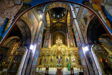 Fototapeta na wymiar Interior of the St. Michael's Golden Domed Cathedral with altar and fragments of frescoes. Kyiv, Ukraine. April 2020