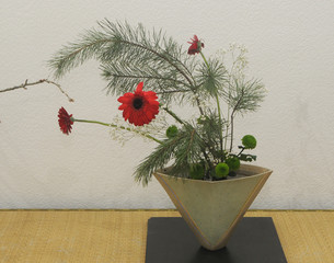 Ikebana is a traditional Japanese flower arrangement. Simple and delicate composition