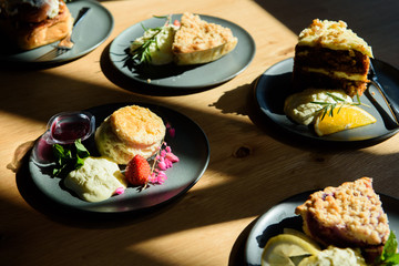 On the beautiful table there is a delicious bakerie. 