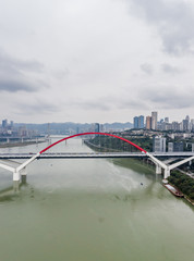 Obraz premium Aerial drone shot of Caiyuanba bridge over Jialing river in Chongqing, southwest China