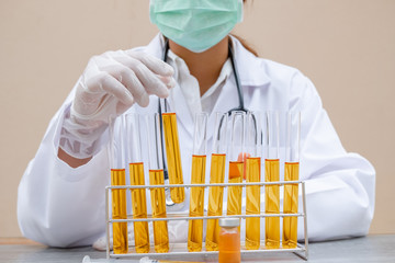 Professional doctors perform testing and analyzing samples of COVID-19 vaccines for immunization prevention and treatment from viral infections. Medical and health care concepts