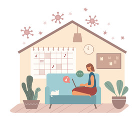 Female freelancer using laptop on sofa during quarantine